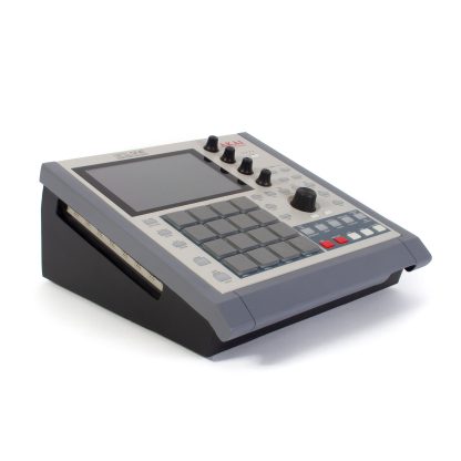 Limited edition retro mpc one with angled protective desk stand with side vent openings image.