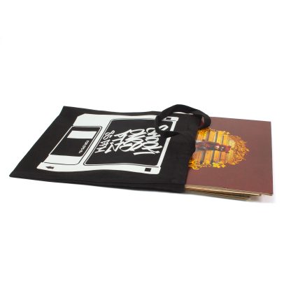 floppy disc design record bag with lp of kayne west's college dropout.